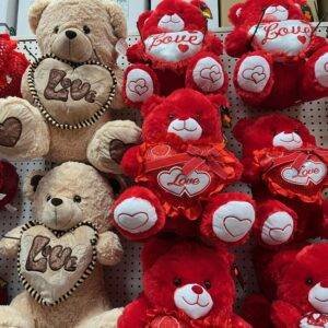 Cute teddy bears with 'Love' hearts perfect for Valentine's Day gifts.